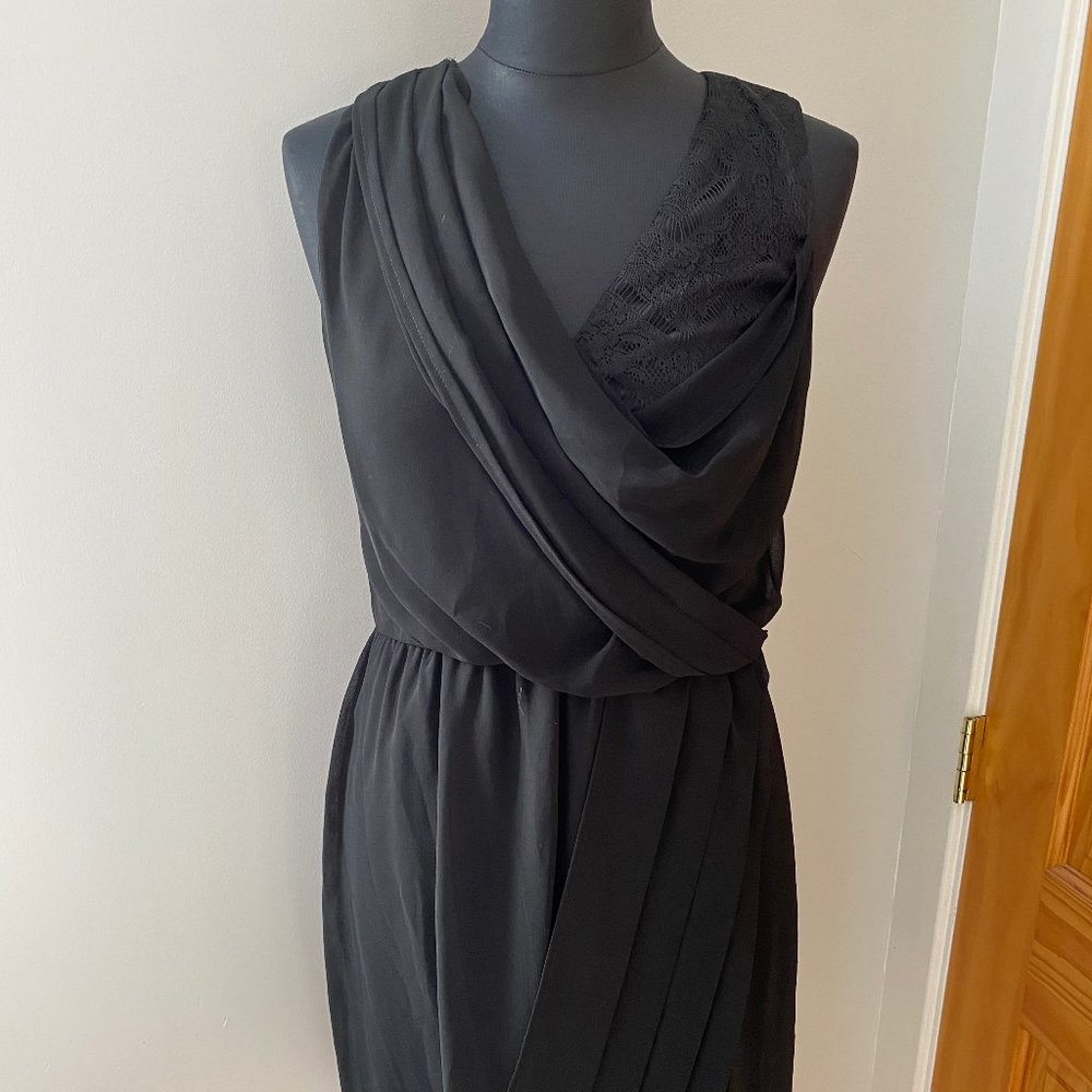 Sleeveless black dress with lace detail